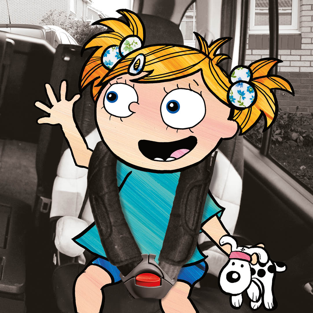 Maggie waving her hand in her car seat